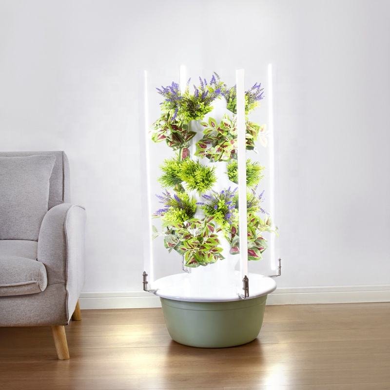 Hydroponic Tower with LED Grow Light in greenhouse